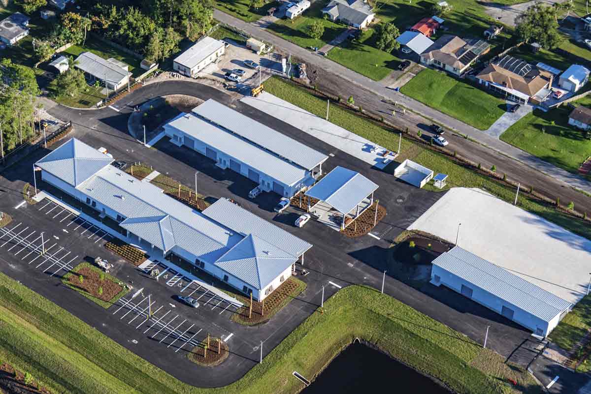 Volusia County Public Works features metal buildings for operations, vehicle storage, ancillary wash rack and ancillary asphalt tack storage. 