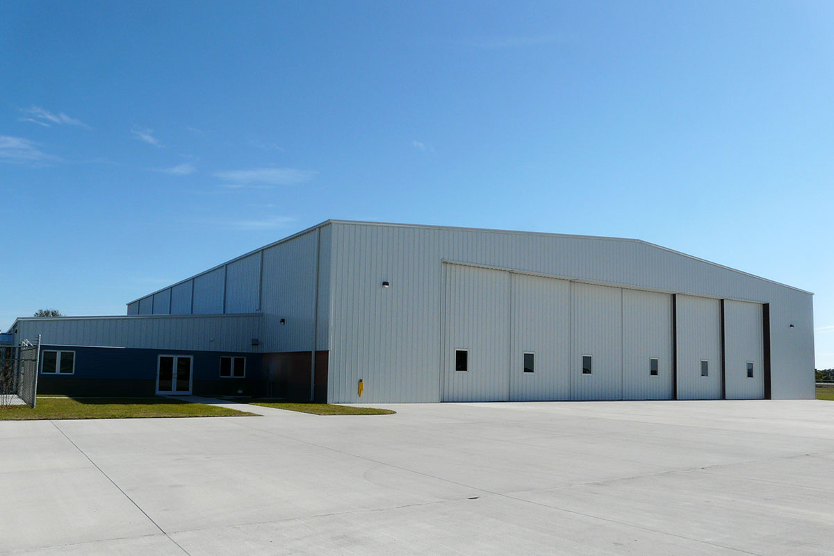 Baer Air Charter’s 24,500-sq-ft metal building hangar at Melbourne International Airport features massive 28-ft-tall doors. Baer Air Charter’s 24,500-sq-ft metal building hangar at Melbourne International Airport features massive 28-ft-tall doors.